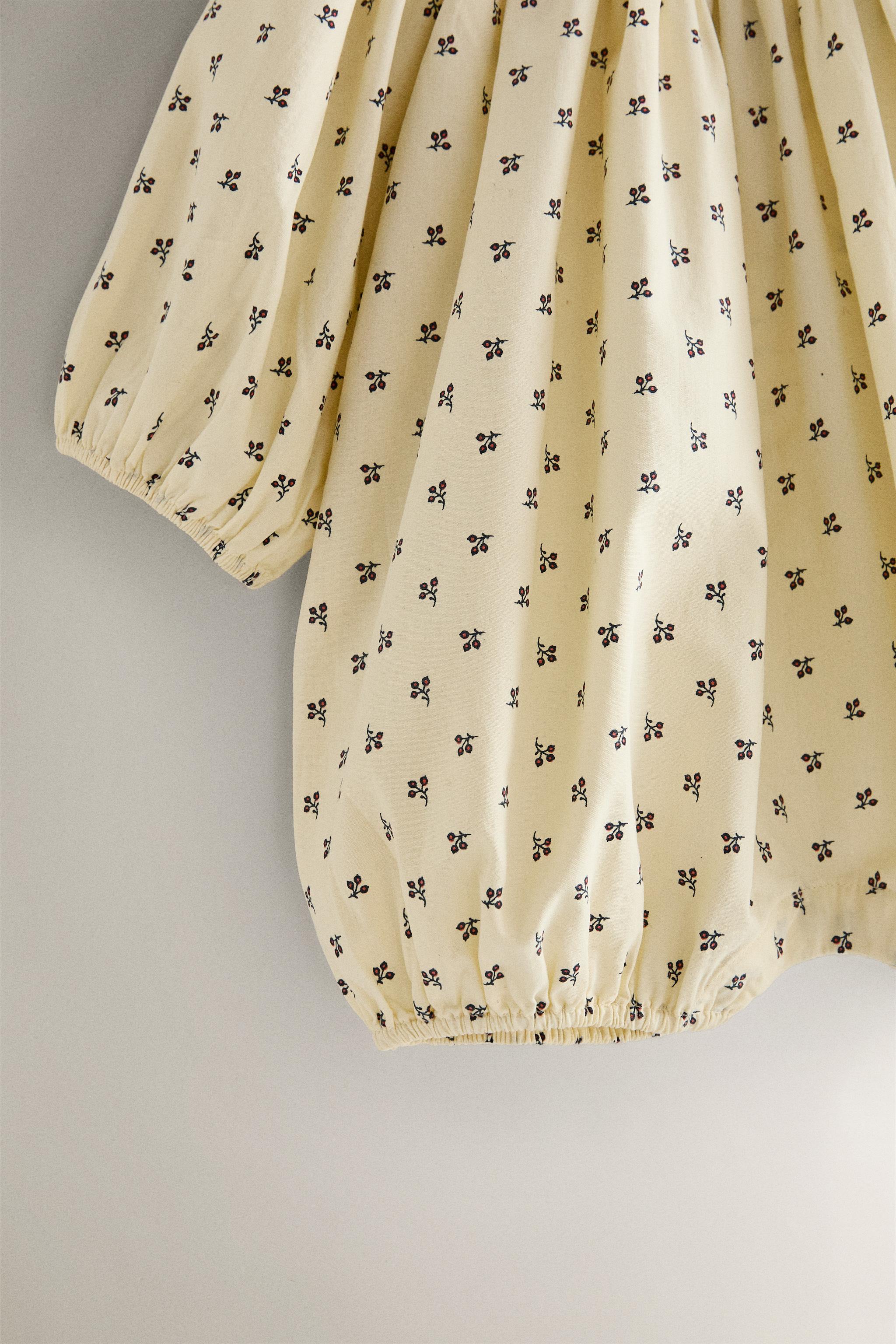 GATHERED FLORAL BABY ROMPER